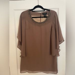 MM Couture - brown cocktail dress with bronze beading detail on neckline.